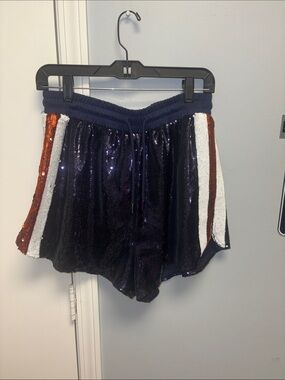 QUEEN OF SPARKLES Navy Sequin Athletic Shorts with White & orange Side Stripes